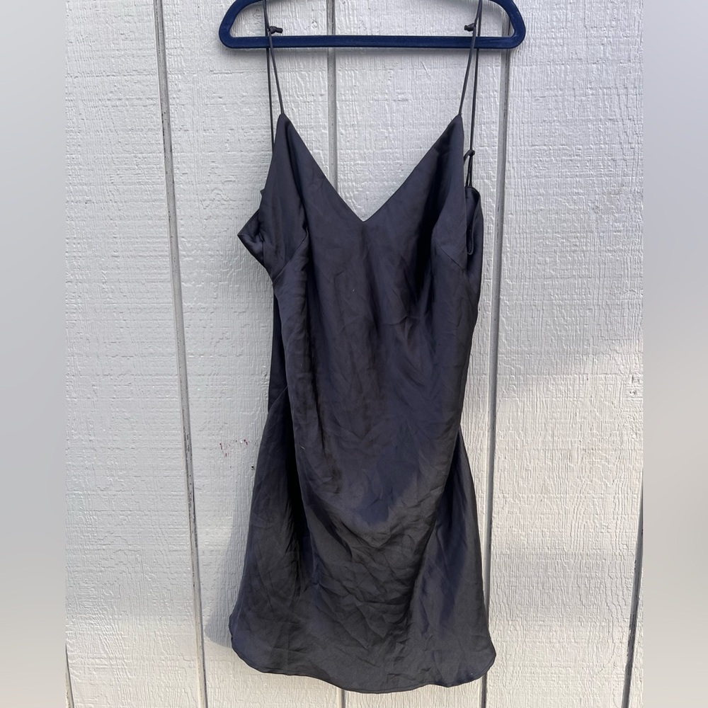 black spaghetti strap mini dress with plunging back Valentine’s Day dress